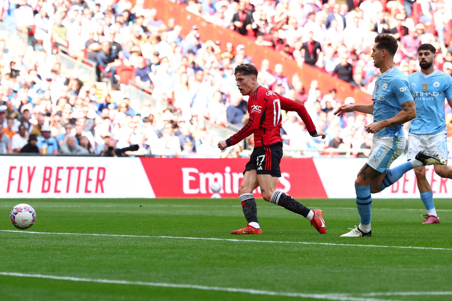 Alejandro Garnacho of Manchester United scores the opening goal during the Emirates FA Cup Final match between Manchester City and Manchester Unite...