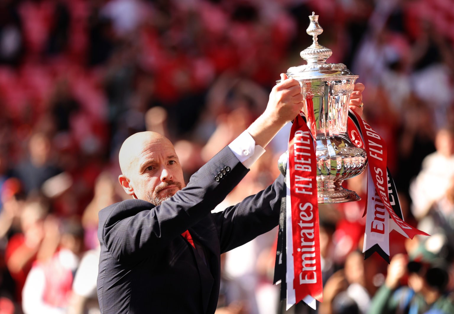 Erik ten Hag, Manager of Manchester United celebrates with the trophy during the Emirates FA Cup Final match between Manchester City and Manchester...