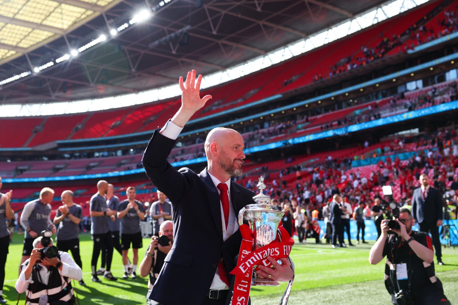 Erik ten Hag Manager/Head Coach of Manchester United celebrates with the trophy after the Emirates FA Cup Final match between Manchester City and M...