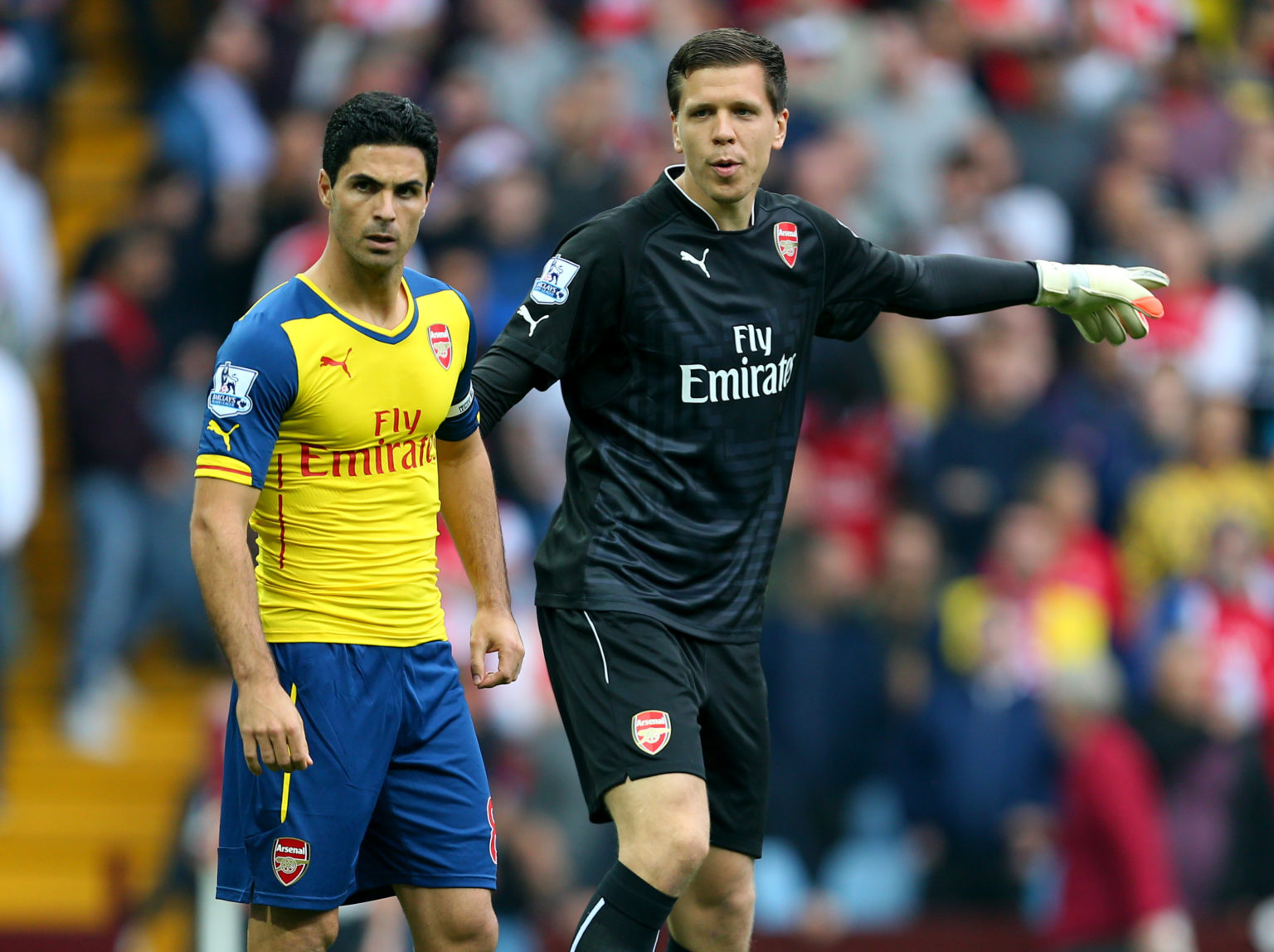 Mikel Arteta of Arsenal and Woljciech Szczesny of Arsenal