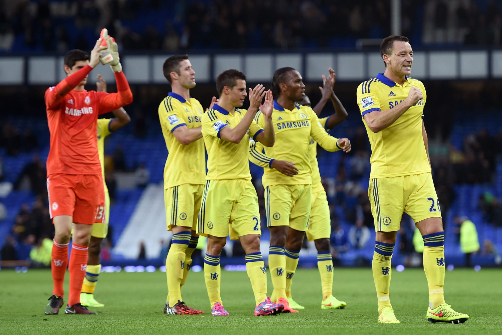 Chelsea players celebrate victory at the end of the game