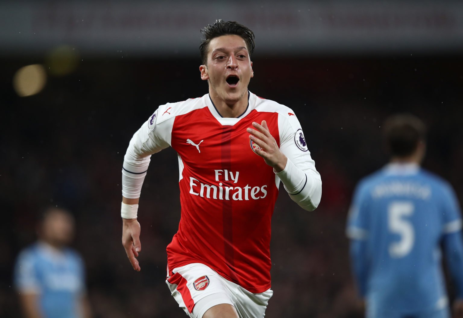 Mesut Ozil of Arsenal celebrates scoring his sides second goal during the Premier League match between Arsenal and Stoke City at the Emirates Stadi...