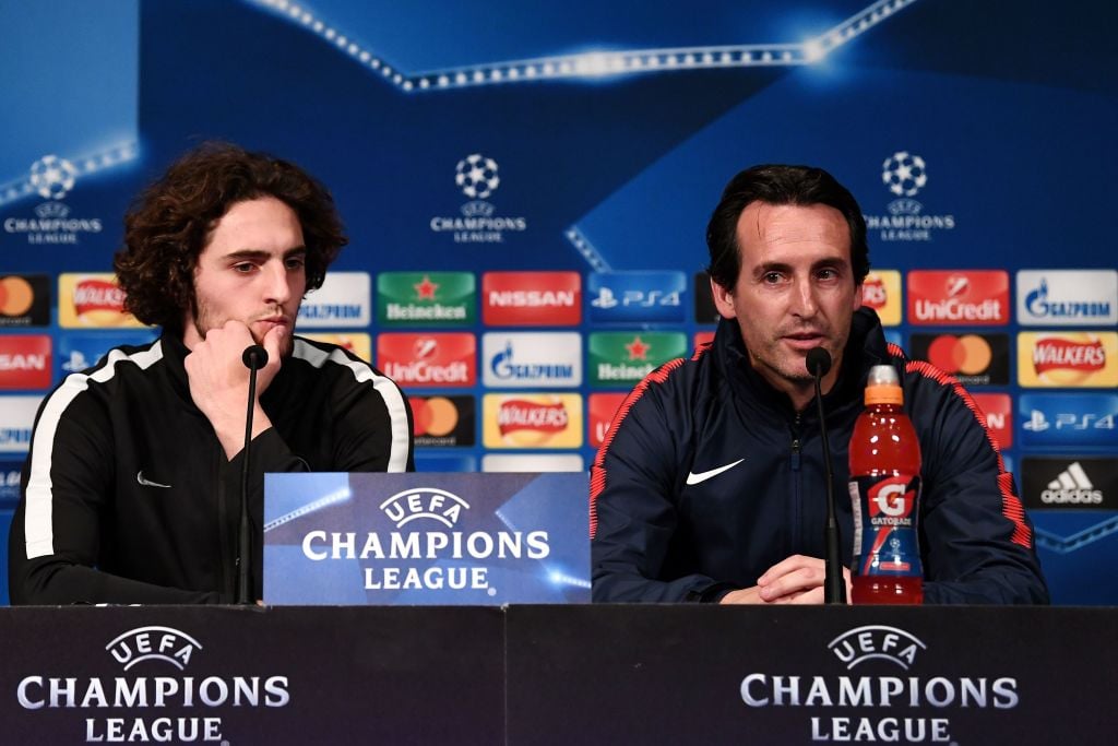 Paris Saint-Germain's Spanish headcoach Unai Emery (R) and Paris Saint-Germain's French midfielder Adrien Rabiot  give a press conference at the Pa...