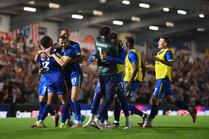 AFC Wimbledon beat Ipswich Tow