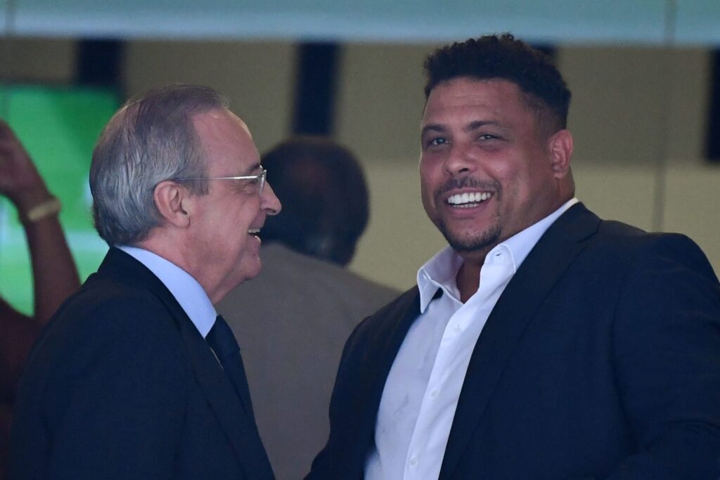 Real Valladolid's majority owner, Brazilian football legend Ronaldo (R) stands with Real Madrid's president Florentino Perez  before the Spanish Le...