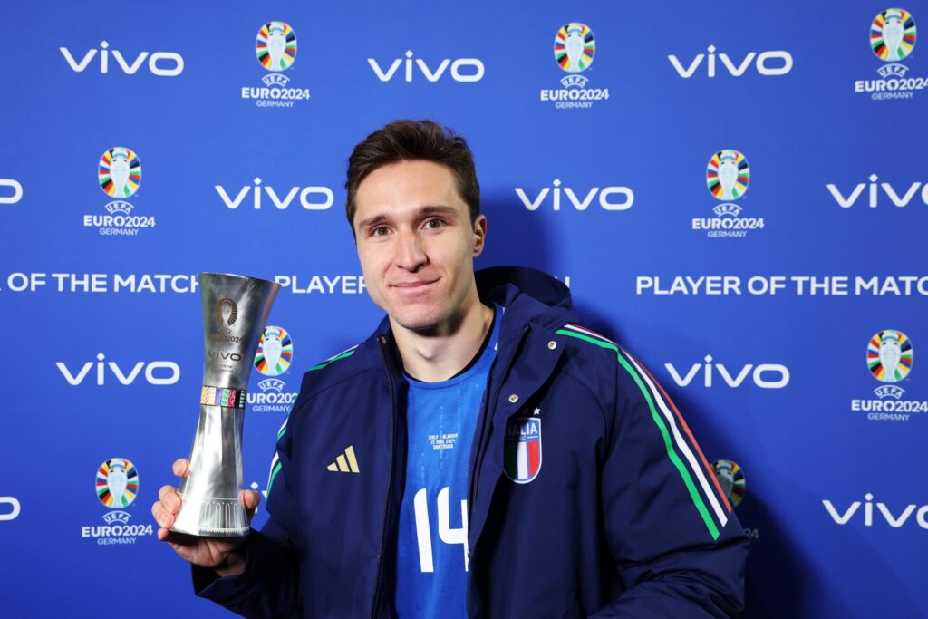 Federico Chiesa of Italy poses for a photo with the vivo Player Of The Match award after the team's victory in the UEFA EURO 2024 group stage match...