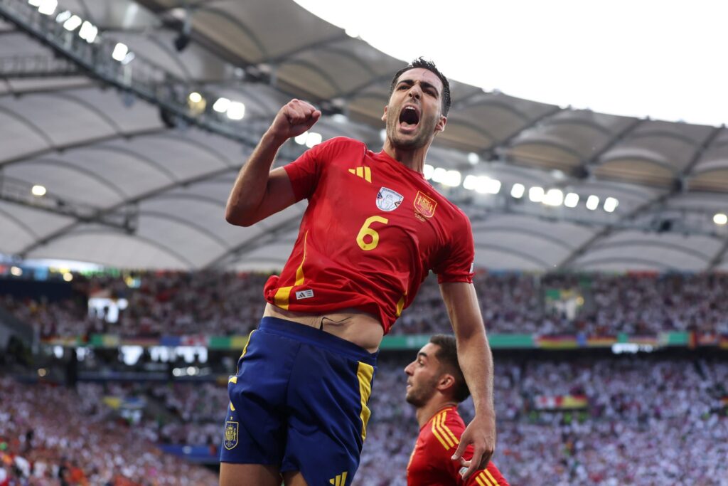 Mikel Merino of Spain celebrates scoring his team's second goal during the UEFA EURO 2024 quarter-final match between Spain and Germany at Stuttgar...