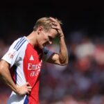 Martin Odegaard of Arsenal reacts during the pre-season friendly match between Arsenal and Olympique Lyonnais at Emirates Stadium on August 11, 202...