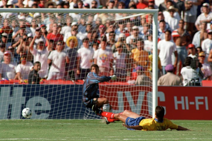 Colombian defender Andres Escobar lies o