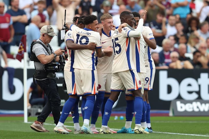 Chelsea's players celebrate scoring against West Ha