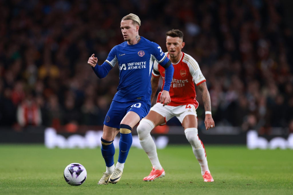 Mykhailo Mudryk of Chelsea tangles with Benjamin White of Arsenal during the Premier League match between Arsenal FC and Chelsea FC at Emirates Sta...