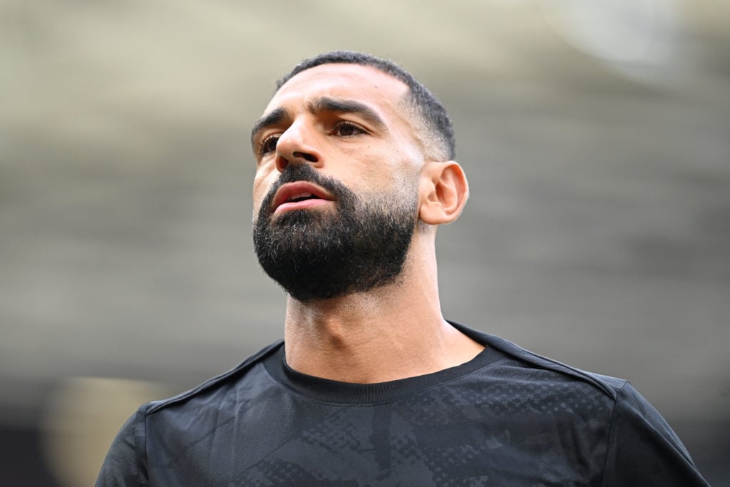 Mohamed Salah of Liverpool looks on during the warm up prior to the Premier League match between Manchester United FC and Liverpool FC at Old Traff...