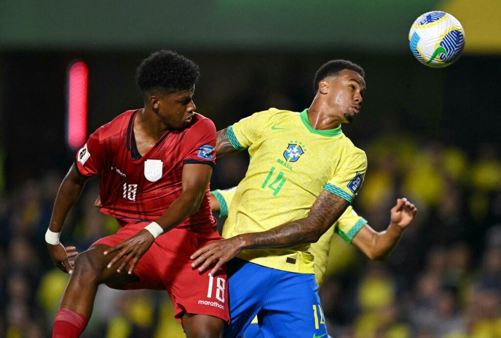 Ecuador's forward John Mercado and Brazil's defender Gabriel Magalhaes fight for the ball during the 2026 FIFA World Cup South American qualifiers ...