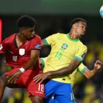 Ecuador's forward John Mercado and Brazil's defender Gabriel Magalhaes fight for the ball during the 2026 FIFA World Cup South American qualifiers ...