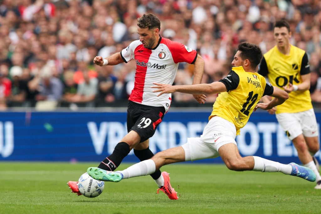 Santiago Gimenez of Feyenoord battles for the ball with Leo Greiml of NAC Breda during the Dutch Eredivisie match between Feyenoord and NAC Breda a...