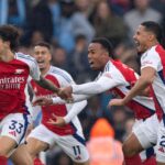 Riccardo Calafiori of Arsenal celebrates scoring with Gabriel Martinelli, Gabriel Magalhaes and William Saliba during the Premier League match betw...