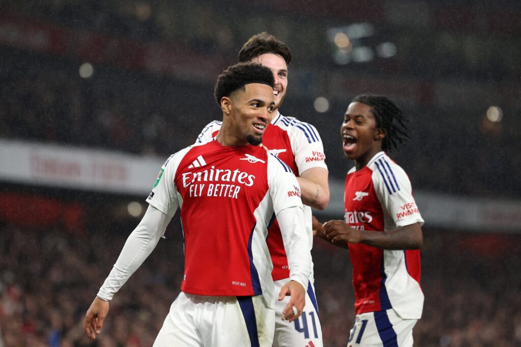 Ethan Nwaneri of Arsenal celebrates scoring his team's third goal with teammates during the Carabao Cup Third Round match between Arsenal and Bolto...