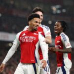 Ethan Nwaneri of Arsenal celebrates scoring his team's third goal with teammates during the Carabao Cup Third Round match between Arsenal and Bolto...