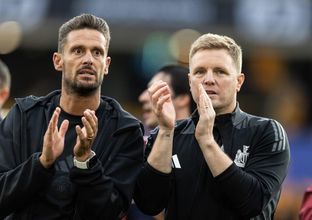 Newcastle United's assistant manager Jason Tindall (left) and manager Eddie Howe applaud their side's travelling supporters at the end of the match...