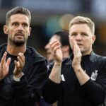 Newcastle United's assistant manager Jason Tindall (left) and manager Eddie Howe applaud their side's travelling supporters at the end of the match...