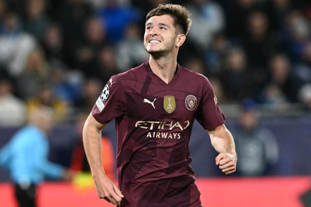 Manchester City's English midfielder #87 James McAtee celebrates scoring his team's fourth goal during the UEFA Champions League football match bet...