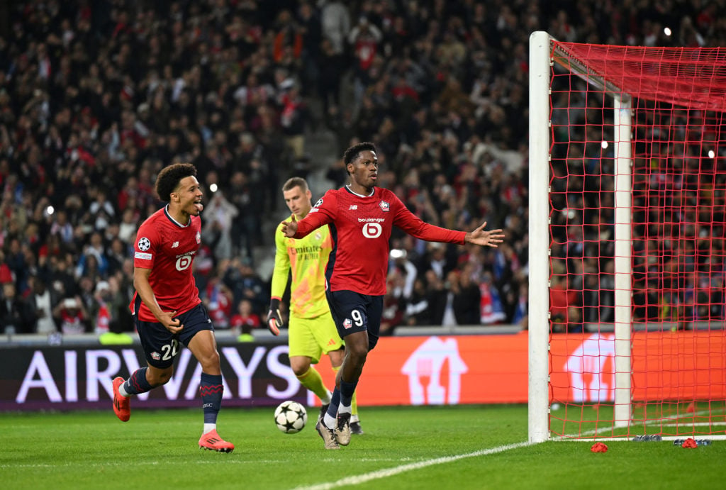 Jonathan David of LOSC Lille celebrates scoring his team's first goal from the penalty spot during the UEFA Champions League 2024/25 League Phase M...