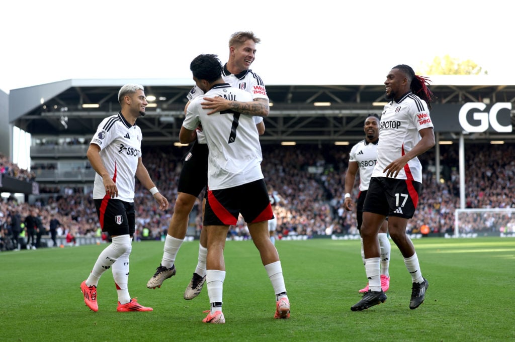 Raul Jimenez of Fulham celebrates scoring his team's first goal with teammates during the Premier League match between Fulham FC and Aston Villa FC...