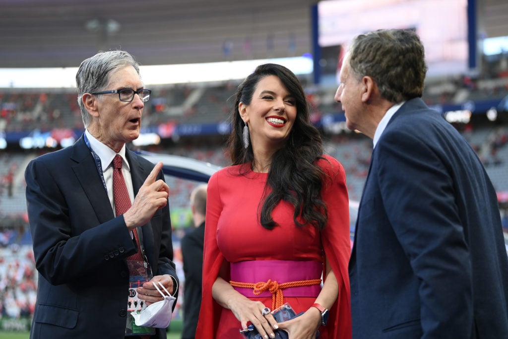 Owners of Liverpool, John W. Henry, wife Linda Pizzuti Henry and Tom Werner interact prior to the UEFA Champions League final match between Liverpo...