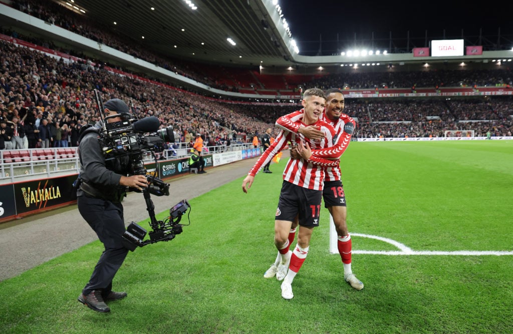 Chris Rigg of Sunderland celebrates with Wilson Isidor after scoring the opening goal during the Sky Bet Championship match between Sunderland AFC ...