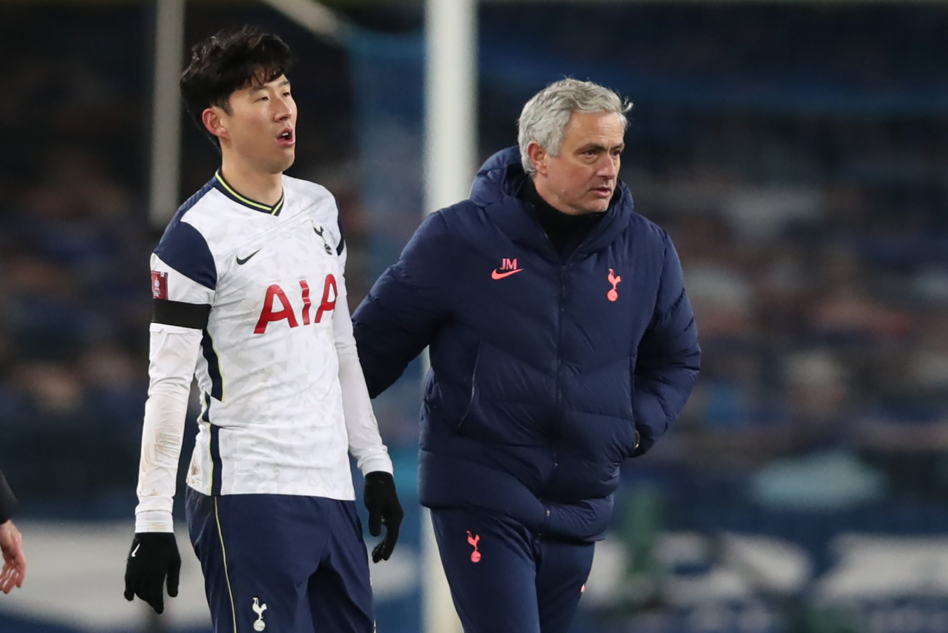 Tottenham Hotspur's South Korean striker Son Heung-Min (L) and Tottenham Hotspur's Portuguese head coach Jose Mourinho react at the final whistle d...