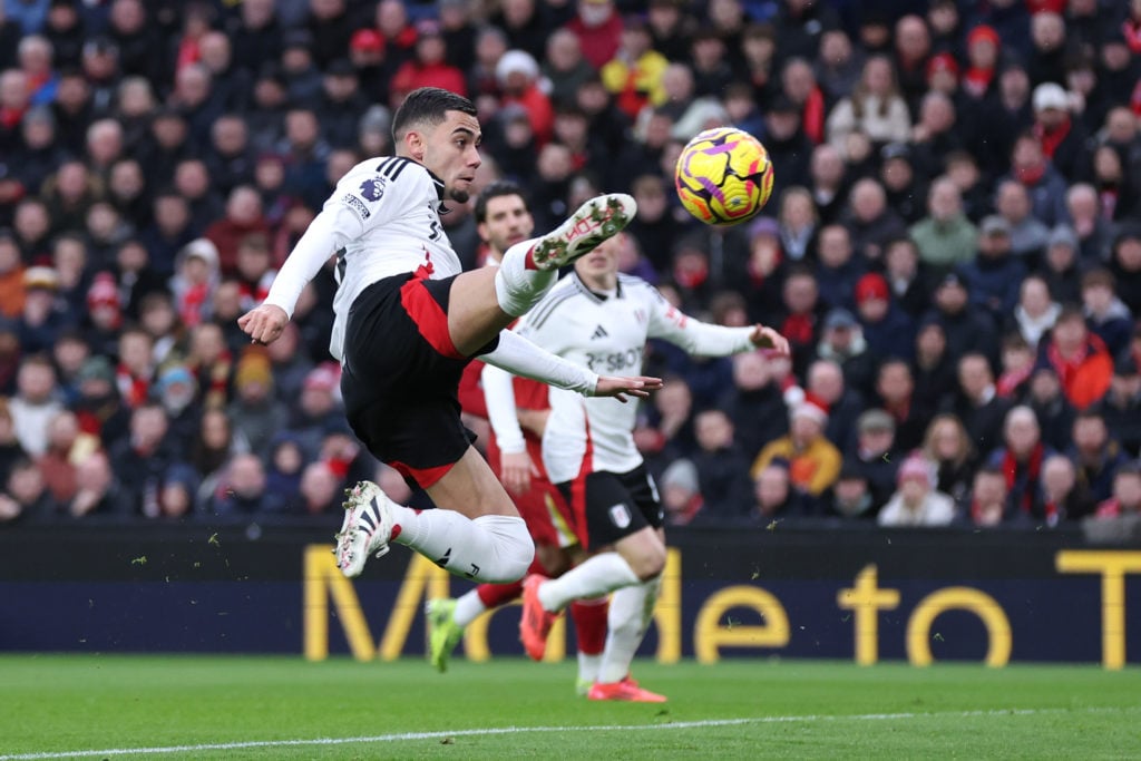 Andreas Pereira of Fulham scores his team's first goal during the Premier League match between Liverpool FC and Fulham FC at Anfield on December 14...